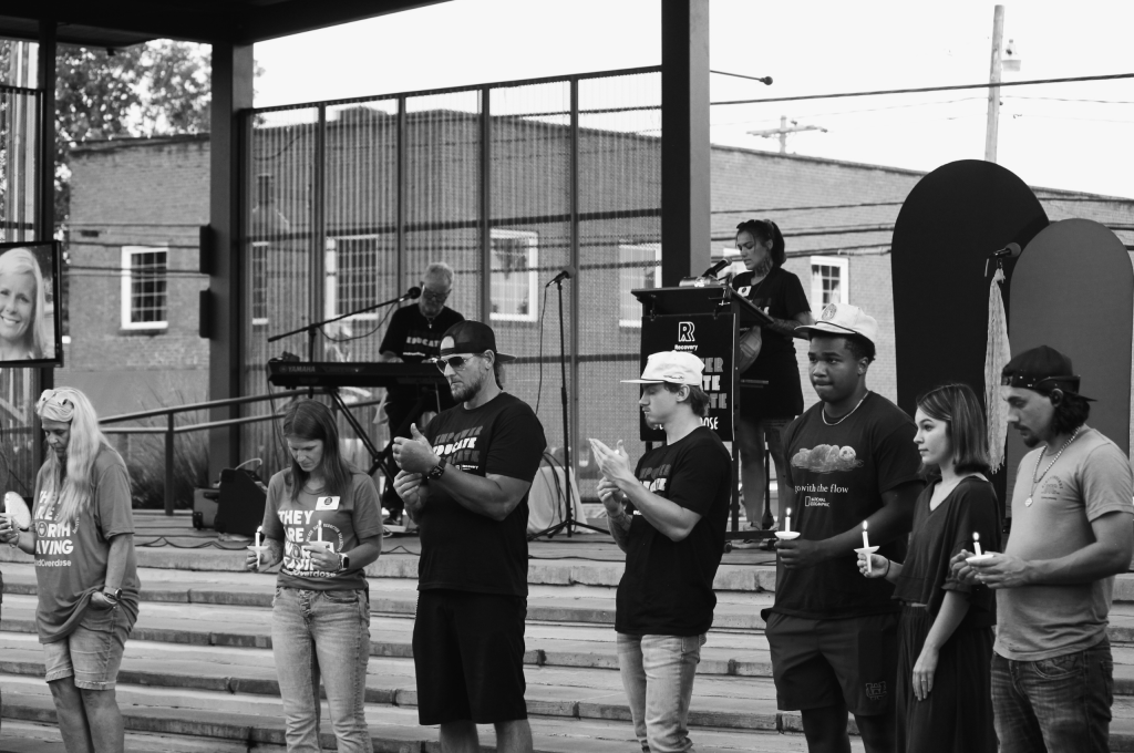 Overdose Awareness Day 2026 Candlelight Service Devin Lyall, Jeff Walker, and Crowd - Black & White
